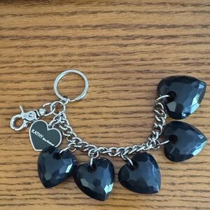 Kathy Van Zeeland Silver Bracelet with Black Heart Charms